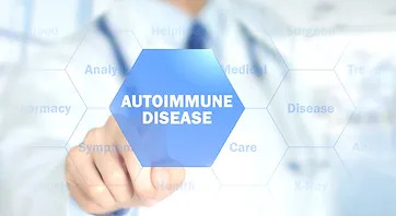 a doctor standing behind a glass wall and pointing to the word "autoimmune disease" in a blue hexagon